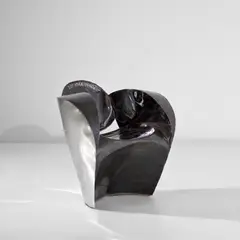 Ron Arad, Unique armchair, circa 1990, Polished stainless steel, patinated steel