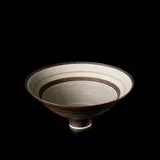 Lucie Rie, Footed bowl, 1969, Porcelain, manganese glaze with concentric bands of sgraffito and inlaid design repeated inside and out