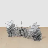 Matias Faldbakken, Untitled (newspaper rack #2), 2010, sculpture comprising newspaper racks, metal band and lever strap
