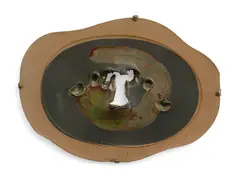 Concetto spaziale by Lucio Fontana, 1961-1962, painted and glazed terracotta, sold Jun 2025