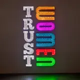 Andrea Bowers, Trust Women, 2021, cardboard and colour changing LED lights, acrylic gel medium
