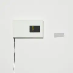 Ryan Gander, Where Nothing Exists but Immeasurable Possibilities / The Black Watch, 2004, flip-dot board in wooden casing and black text rubdown transfer