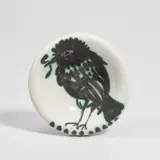 Pablo Picasso, Oiseau au ver (Bird with Worm) (A.R. 172), 1952, White earthenware round ashtray painted in black with partial brushed glaze