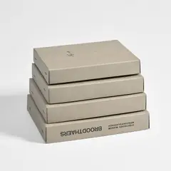 Fig.1, Fig. 2, Fig. 0, Fig.12 by Marcel Broodthaers, 1971, The complete set of four grey nested cardboard boxes with printed text, sold Jan 2025