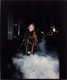 Cookie in the NY Inferno, from 1989: A Portfolio Honouring Artists Lost to AIDS by Nan Goldin, 1985/2000, Cibachrome print, on gloss photo paper, the full sheet, sold Jan 2025