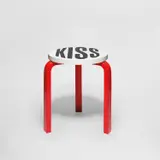 Barbara Kruger, Untitled (Kiss), 2019, Artek Stool 60 in birch, birch plywood and laminate, designed by Alvar Aalto, in black, white and red, contained within the original card box