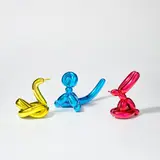 Jeff Koons, Balloon Swan (Yellow); Balloon Monkey (Blue); and Balloon Rabbit (Red), 2017, Three porcelain multiples painted in chrome, all contained in the original Styrofoam-lined boxes with silver printed signature