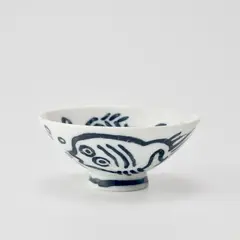 Untitled (Pop Shop Tokyo, Rice Bowl) by Keith Haring, 1987, White ceramic bowl printed in dark teal and glazed, sold Jun 2025