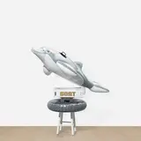 Jeff Koons, GOAT: A Tribute to Muhammad Ali (Champ's edition); with Radial Champs, 2004, The complete deluxe "Champ's Edition" set, including Radial Champs comprised of a wooden stool, inflatable dolphin and tyre floatie, air pump and lucite supports, accompanied by installation directions and original cardboard boxes, four gelatin silver prints signed in black felt-tip pen by Howard L. Bingham and Muhammad Ali, and large book of photographs and text