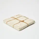 Christo & Jeanne-Claude, Wrapped Book (S. 68), 1973, Multiple comprised of the book Christo by David Bourdon wrapped in canvas with twine