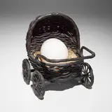 Liz Craft, Baby Carriage, 2008, bronze, porcelain, raffia