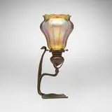 Candlestick by Tiffany Studios, c. 1910, patinated bronze, hand-blown glass, sold Mar 2026