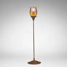 Ribbed shade by Tiffany Studios, c. 1910, hand-blown Favrile glass, patinated metal, sold Mar 2026