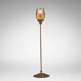 Ribbed shade by Tiffany Studios, c. 1910, hand-blown Favrile glass, patinated metal, sold Mar 2026