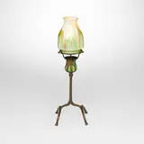 Tiffany Studios, Blown-out candlestick with ribbed pulled-feather shade, c. 1910, patinated bronze, hand-blown Favrile glass
