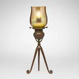 Tiffany Studios, Tripod candlestick with ribbed shade, c. 1910, patinated bronze, hand-blown Favrile glass