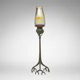 Tiffany Studios, Root candlestick with shade, c. 1910, patinated bronze, hand-blown Favrile glass