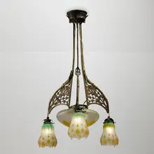 Chandelier by Daum, c. 1920, vitrified and acid-etched glass, patinated cast bronze, sold Mar 2026