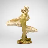 Amphora figure of Loïe Fuller by Stellmacher Riessner & Kessel, c. 1894, glazed and gilt porcelain, sold Mar 2026