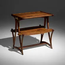 Marquetry tea table with aquatic flowers by Louis Majorelle, c. 1900, mahogany, mixed wood inlay, gilt bronze, sold Mar 2026