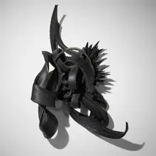 Chakaia Booker, Second Shift, 2005, rubber tire, screws and wood