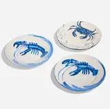 Dedham Pottery, Collection of three plates