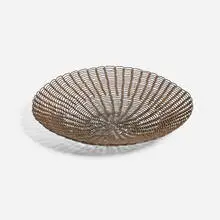 Dish by Tohono O'odham, c. 1925, woven steel bailing wire, sold Oct 2025