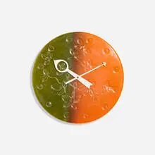 Meridian wall clock by George Nelson & Associates, c. 1965, glazed ceramic, lacquered aluminum, brass, sold Sep 2025