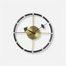Steering Wheel clock, model 4756 by George Nelson & Associates, 1949, enameled steel, enameled aluminum, brass, vinyl, sold Sep 2025