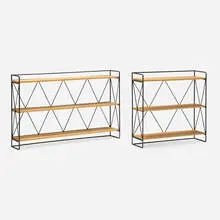 Shelving units, set of two by Paul McCobb, c. 1990, maple plywood, painted steel, sold Sep 2025