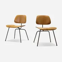Charles and Ray Eames, DCMs, pair, aniline-dyed birch plywood, chrome-plated steel, rubber