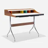 Swag Leg desk, model 5850 by George Nelson & Associates, walnut, laminate, chrome-plated steel, painted wood, plastic, sold Sep 2025