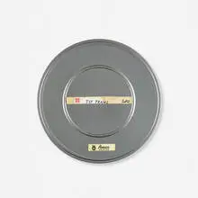 Charles and Ray Eames, Toccata for Toy Trains, 1957, 16mm film reel in canister