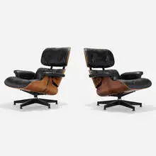 Charles and Ray Eames, 670 lounge chairs, pair, rosewood plywood, leather upholstery, enameled and brushed aluminum, rubber