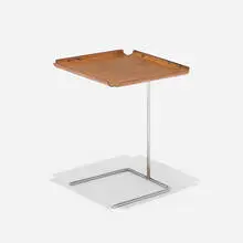 Tray table, model 4950 by George Nelson & Associates, 1949, chrome-plated steel, ash plywood, sold Sep 2025