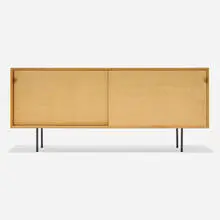 Cabinet, model 116 by Florence Knoll, birch, grass cloth, enameled steel, leather, sold Sep 2025