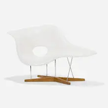 Charles and Ray Eames, La Chaise, lacquered fiberglass, chrome-plated steel, oak