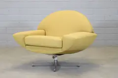 Swedish 'Capri' lounge chair by Johannes Andersen, 1958, upholstered throughout in yellow wool fabric, sold Jul 2024