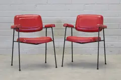 Pierre Paulin, Pair of 'Model CM197' desk chairs, 1957, back and armrests upholstered in black vinyl