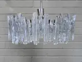 Julius Theodor Kalmar, Austrian 'Ice Glass' chandelier, 1960s, the circular chromed frame hung with moulded glass shades