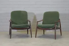 Hartmut Lohmeyer, Pair of German 'Model 400' teak and cane lounge chairs, 1962, each with a woven rattan back