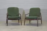 Hartmut Lohmeyer, Pair of German 'Model 400' teak and cane lounge chairs, 1962, each with a woven rattan back