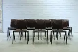 Friso Kramer, Set of twelve 'S22' stacking chairs, 1970s, raised on black steel compass supports