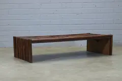 1970s by Percival Lafer, a Brazilian brutalist rosewood and mahogany coffee table, sold Jul 2024