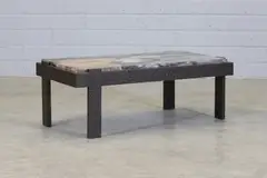 Jerome Abel Seguin, Coffee table, c.2018, on a salvaged cast iron frame and legs
