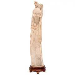 Sabio Oriental, CHINA, SIGLO XX, Talla en marfil con detalles entintados y base de madera