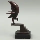 Sergio Bustamante, LUNA EN TRAMPOLÍN, Bronce, patinado en color marrón