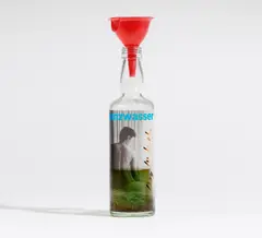 Auktion 404, Los 930 by Isa Genzken, 1994, Glasflasche mit Klebefolie, Kunstharz und Trichter, sold Dec 2017