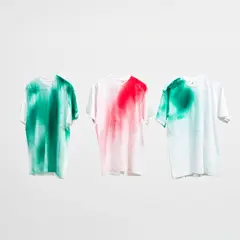 Katharina Grosse, Untitled (three t-shirts), 2007, Three unique spray-painted t-shirts, all contained in the original cans with printed card labels