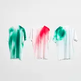 Katharina Grosse, Untitled (three t-shirts), 2007, Three unique spray-painted t-shirts, all contained in the original cans with printed card labels